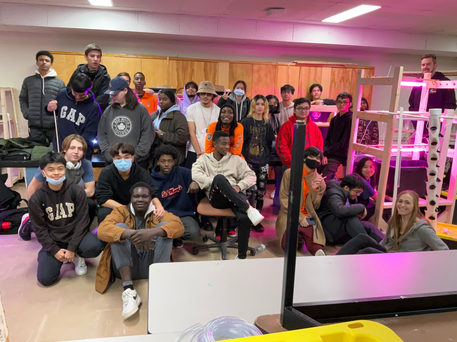 St. Johns High School pre-engineering students with the indoor growing systems they built